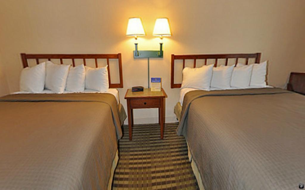 Norwood Inn And Suites Chaska Quarto foto